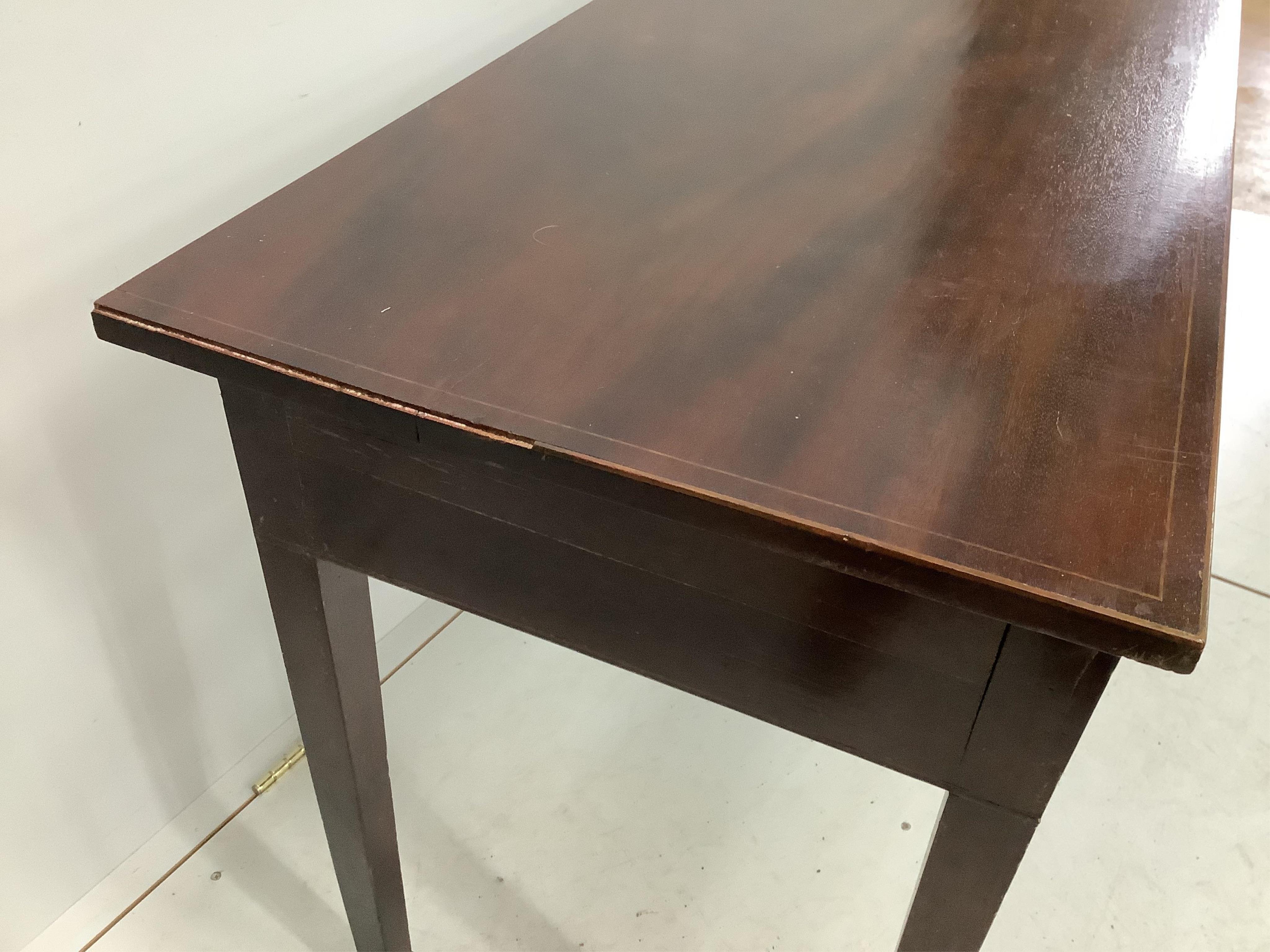 A George III mahogany two drawer side table, width 114cm, depth 54cm, height 70cm